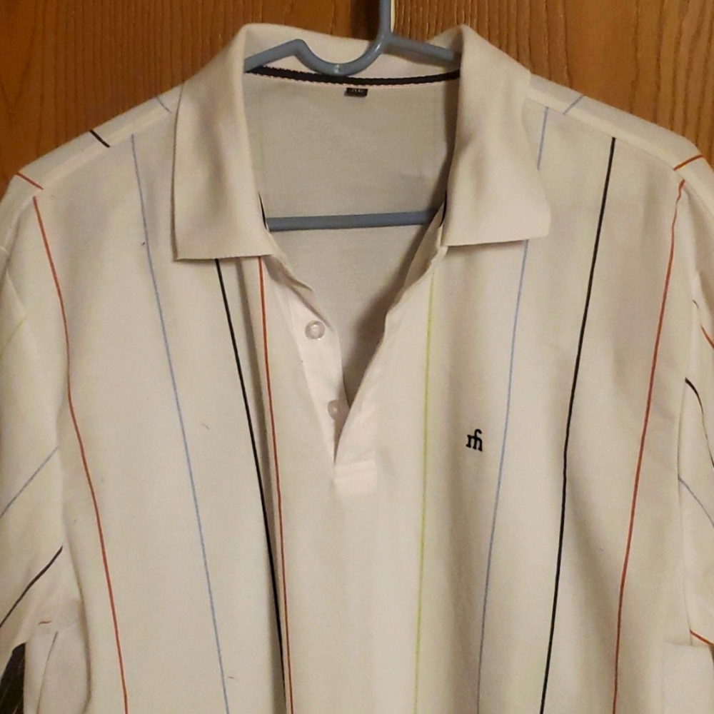White polo shirt multi colored strips.  Only worn a handful of times.